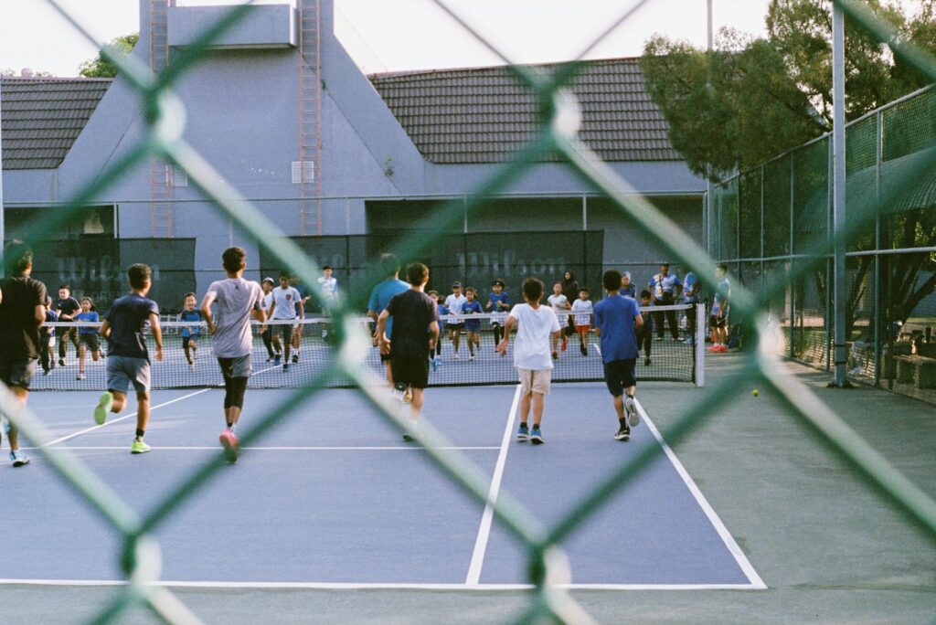 Quiet luxury tennis style with a knit polo and clean whites