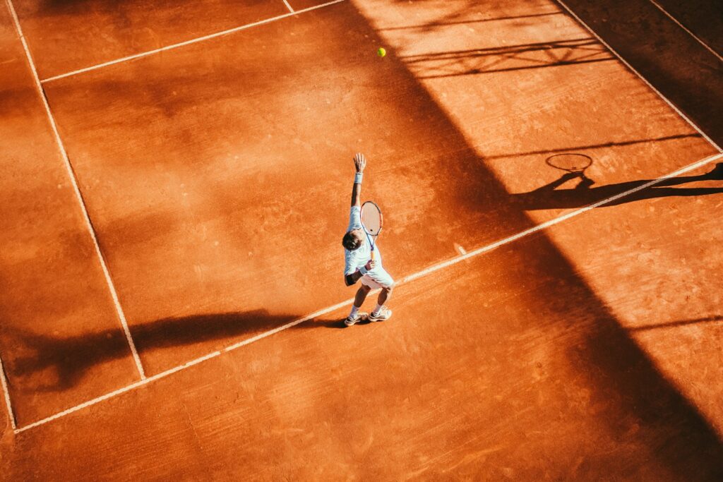 Woman in a tennis outfit on a tennis court